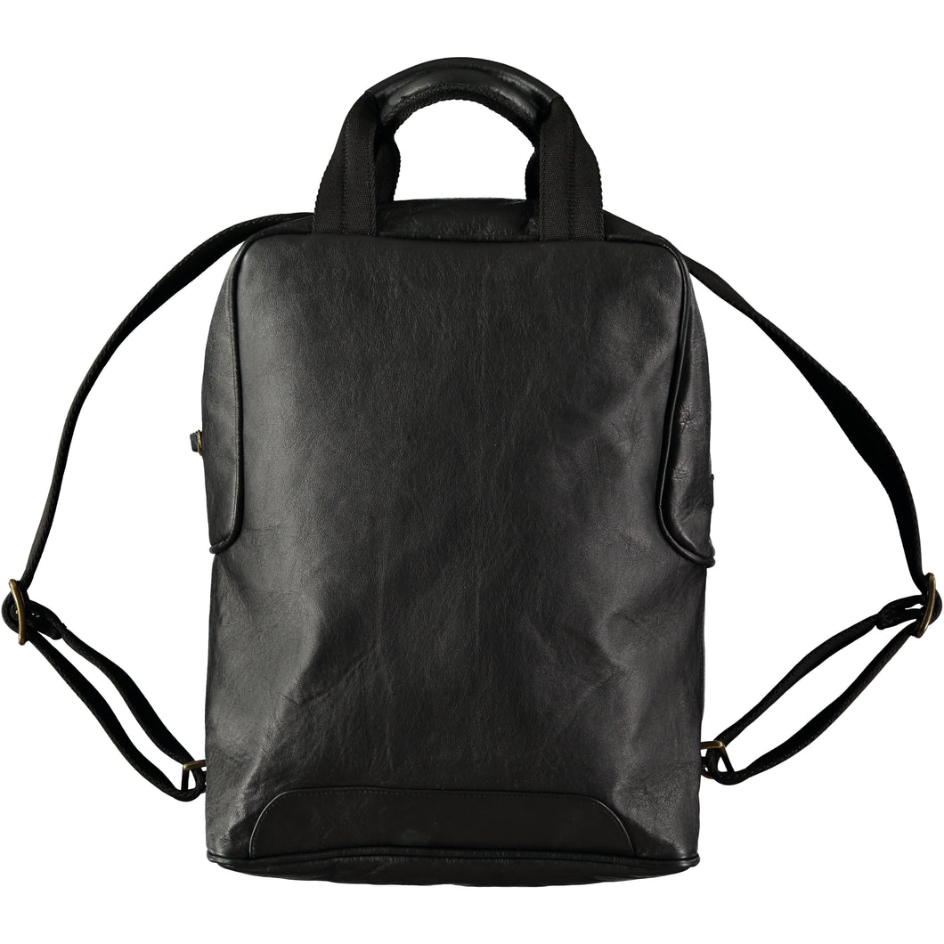 Large rectangular simple-style backpack with adjustable, retractable shoulder straps. Handmade leather products made in Barcelona, Spain by a family-owned company for over 35 years